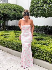 Elegant white floral tube maxi dress with pink roses and slim fit fishtail silhouette