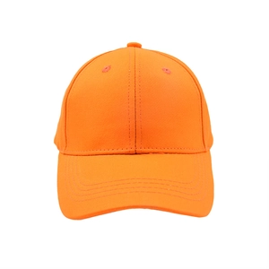 Detail of solid orange cotton baseball cap with six panels and reinforced stitching