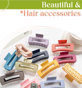 Detail of colorful matte square hair claw clips in various macaron tones set on white background