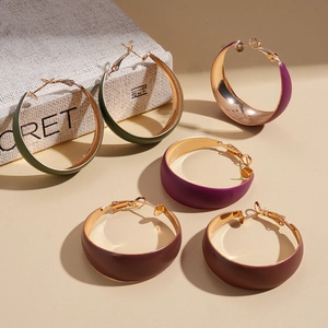 Minimalist geometric circular hoop earrings with matte lacquer finish in three colors