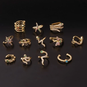 Set di 12 ear cuff dorati con design a serpente e stella e zirconi multicolore