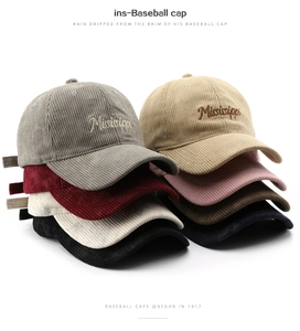 Multiple colors of corduroy baseball caps with Mississippi embroidery on white background