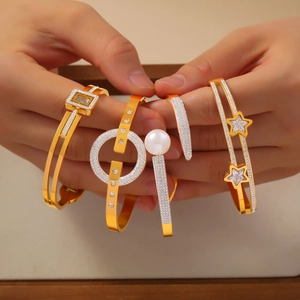 Elegant multi-layer gold plated titanium bracelet set with geometric rhinestones and pearls