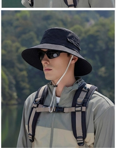 Outdoor waterproof sun hat with wide brim and adjustable chin strap for hiking