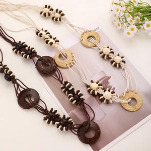 Bohemian braided waist belt with wooden beads and rings in brown and beige colors