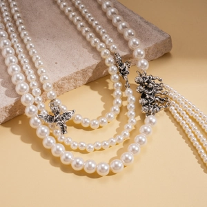 Elegant multi-layer pearl necklace with vintage silver angel wing pendant for women