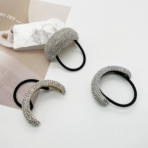 Sparkling rhinestone ponytail holder with metallic base in gold and silver finish
