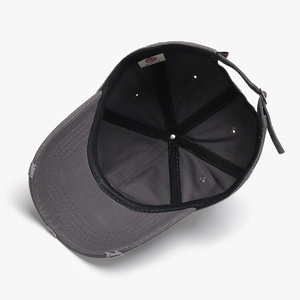 Deep grey distressed baseball cap with bow-tie accent and adjustable metal strap back