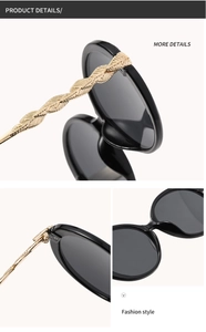 Detail of golden metal leaf-patterned temples on black round frame fashion sunglasses