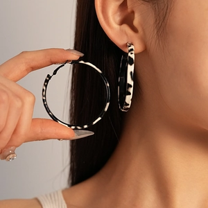 Vintage leopard print round hoop earrings in black and white pattern for women