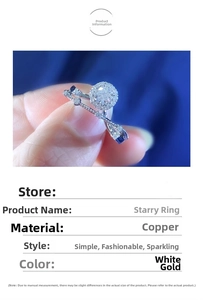Detailed view of Starry Ring in copper with white gold finish and round main stone