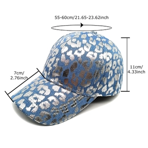 Blue denim baseball cap with metallic leopard print and detailed size specifications