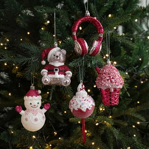 Five-piece magenta glitter Christmas tree ornaments featuring snowman and bear shapes