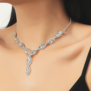 Elegant silver-toned bridal jewelry set featuring a marquise-cut crystal Y-necklace