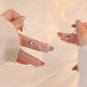 Elegant S925 sterling silver star and moon pendant necklace with delicate zircon stones