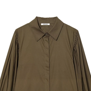 Olive green poplin shirt featuring stylish puff sleeves and a sophisticated turn-down collar