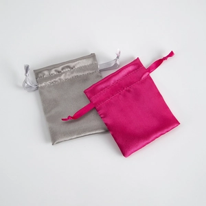 Silky satin drawstring gift bags in grey and magenta colors for jewelry storage