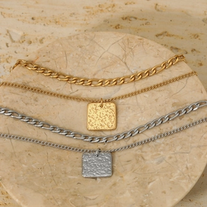 Double-layered 316 stainless steel necklaces with gold and silver square hammer pendants