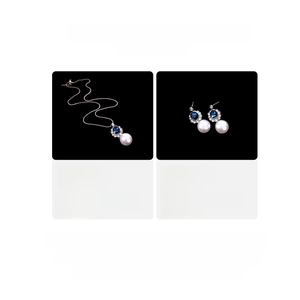 Detailed size and material specifications for crystal and faux pearl jewelry set