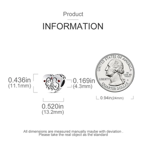 Size reference for heart charm bead with kissing couple engraving next to a coin