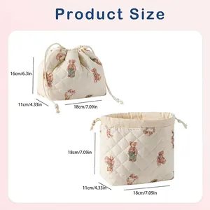 Quilted bear pattern makeup bag with drawstring closure showing detailed dimensions