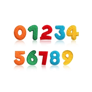 Macro detail of colorful chenille numbers 0-9 embroidery patches with soft towel texture