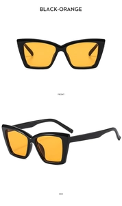 Vistas frontal y lateral de gafas de sol cat eye con montura negra y lentes naranjas