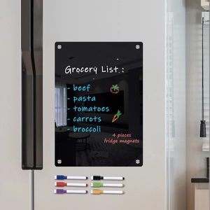 Close-up of black acrylic magnetic weekly calendar with six colorful dry erase markers