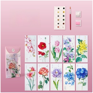 Flat lay of watercolor bookmark set including floral papers, 12 colors and fine brush