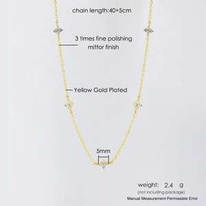 Detail of clover necklace with blue zircon and dimensions 40+5cm length and 5mm pendant