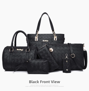 Detailed view of 6-piece black woven leather handbag set with gold hardware on white background