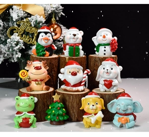 Miniature resin Christmas figurines featuring cute animals and tree on wood base