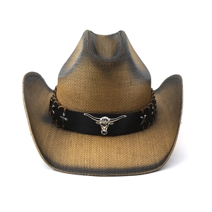 Detail of western straw hat with brown gradient weave and silver bull head emblem