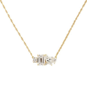 Geometric gold necklace with emerald-cut zircon pendant and micro-paved accents