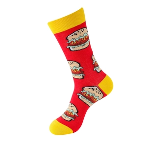 Detail of red crew socks with yellow trim and all-over hamburger pattern print