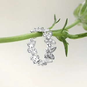 Detailed macro view of S925 silver butterfly ring with sparkling zircon stones
