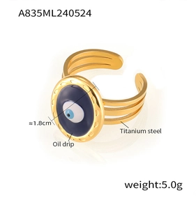 Detail of gold evil eye titanium steel ring showing dimensions and oil drip craft