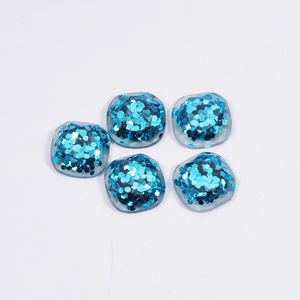 Five square blue resin pieces with hexagonal glitter sequins for DIY jewelry making
