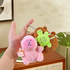 Cute Capybara and pink plush doll keychains with turtle and milk bottle accessories