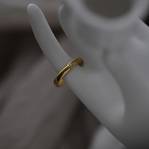 Minimalist 18K gold plated titanium steel star ring with small crystal inlay on hand