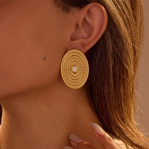 Exaggerated gold oval titanium steel earrings with white gemstone and retro dot texture