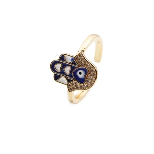 Bague Main de Fatima dorée avec émail œil bleu et accents en zircon étincelants
