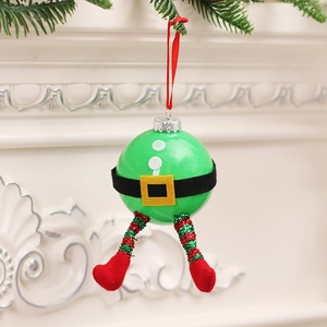 Creative elf Christmas ball ornament hanging on a tree with festive green and red details