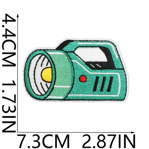 Teal embroidered flashlight patch measuring 7.3cm x 4.4cm on a plain white background