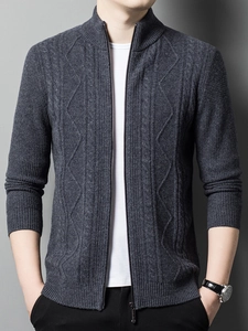 Detail of men's charcoal grey zip cardigan showing knitted texture and stand collar
