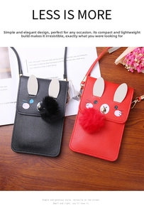 Detail view of cute cartoon rabbit mini crossbody bags in black and red faux leather