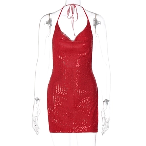 Detail of red sequined mini dress featuring a cowl neck and halter style on mannequin