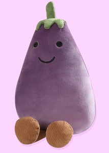 Close-up of cute purple eggplant plush pendant with green leaves and corduroy feet