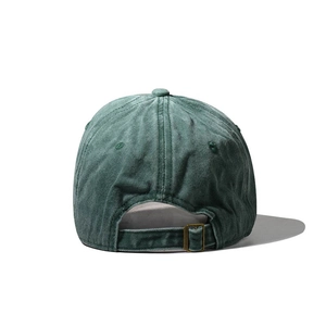 Detail view of dark green washed cotton baseball cap with adjustable metal back buckle