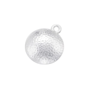 Macro shot of silver round flower pendant with unique hammered texture for jewelry making
